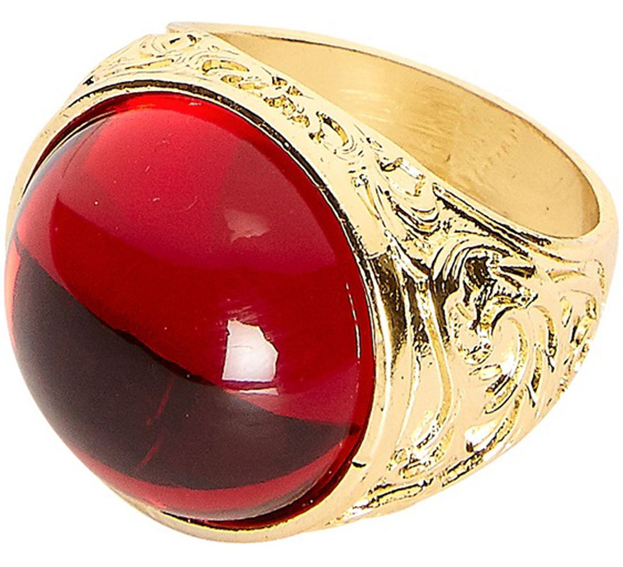 Golden ring with red gem