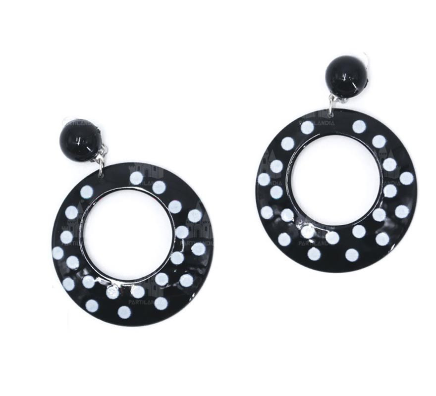 Brincos médios ovais pretos com bolinhas brancas